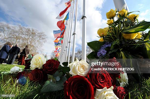 View of flowers taken in front of the Palais de l'Europe in Strasbourg, eastern France, on April 12, 2010 during a service to commemorate the victims...