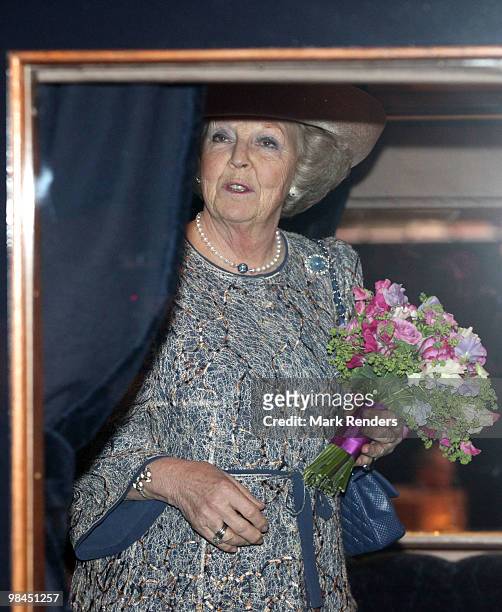 Queen Beatrix from The Netherlands poses for a photo in an old train during her visit at the exhibition "Royal Class, Royal Travels", at Railway...