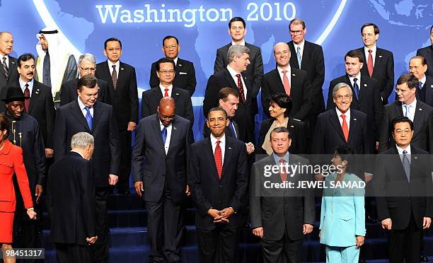 President Barack Obama poses with other world leaders before the plenary session of the Nuclear Security Summit at the Washington Convention Center...