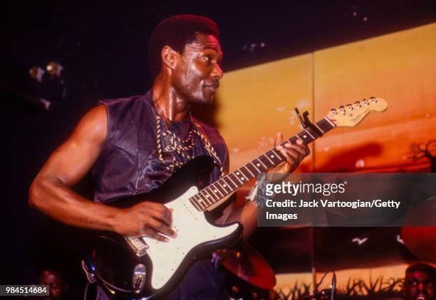 Sam Fan Thomas from Cameroon performs 'makossa' music on guitar and vocals with his band at Club Kilimanjaro in New York, New York, August 3, 1990.