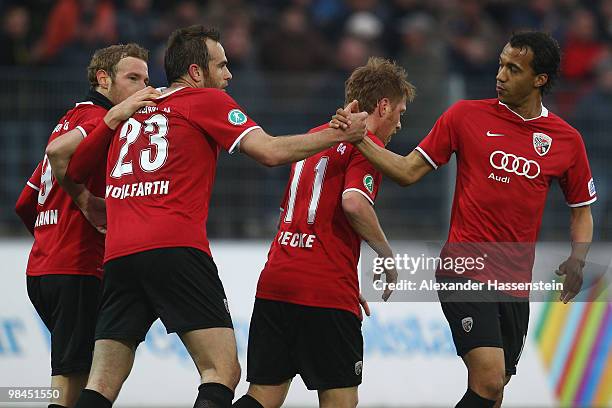 Moritz Hartmann of Ingolstadt celebrates scoring the opening goal with his team mates Steffen Wohlfahrt , Andreas Neuendorf and Moise Bambara during...