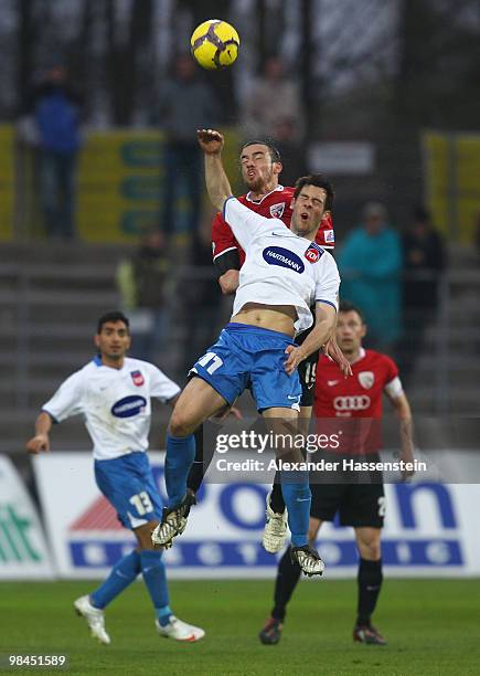 Malte Metzelder of Ingolstadt battles for the ball with Patrick Mayer of Heidenheim during the 3.Liga match between FC Ingolstadt and 1. FC...