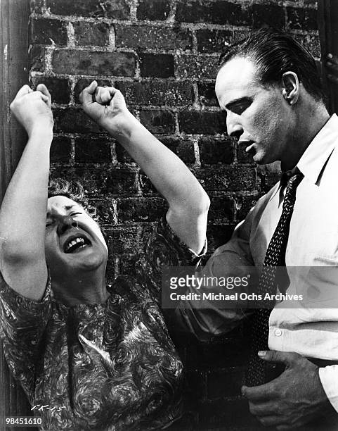 Actor Marlon Brando portrays Valentine "Snakeskin" Xavier as an actress emotes in a still from the movie 'The Fugitive Kind' which was released in...