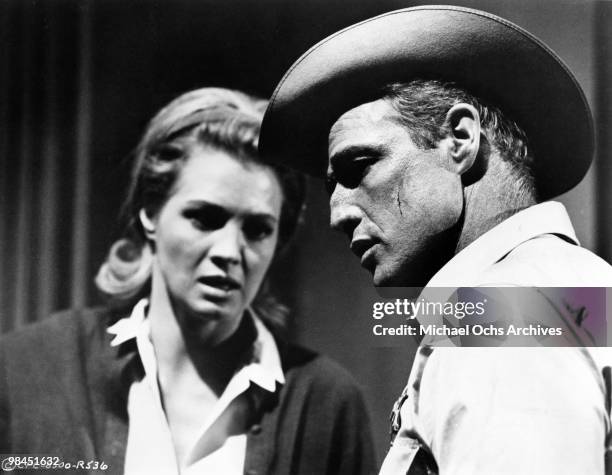 American actors Marlon Brando, as Sheriff Calder, and Angie Dickinson as Ruby Calder, in 'The Chase', directed by Arthur Penn, 1966.