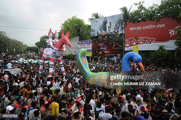 Revellers attend a rally in celebration of the Bengali New Year or �Pohela Boishakh� in Dhaka on April 14, 2010. The Bengali calendar or Bangla...