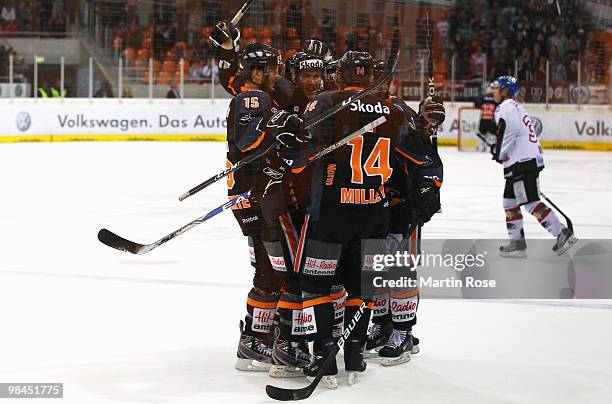 The team of Wolfsburg celebrate their first goal during the third DEL play off semi final match between Grizzly Adams Wolfsburg and Augsburger...