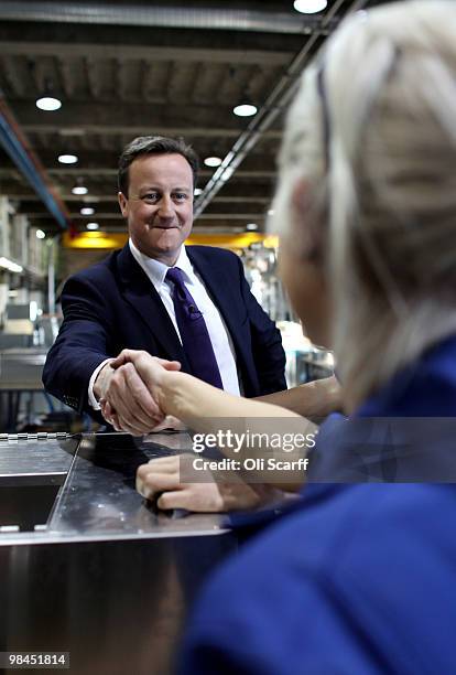 David Cameron, the leader of the Conservative party, meets BAE Systems apprentice Clare Harris on April 14, 2010 in Barrow-in-Furness, England....