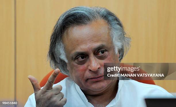 Indian Minister of Environment and Forests Jairam Ramesh gestures during the launch of a Monitoring System for Tigers - Intensive Protection and...