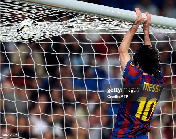 Barcelona's Argentinian forward Lionel Messi celebrates during the 'El Clasico' Spanish League football match Real Madrid against Barcelona at the...