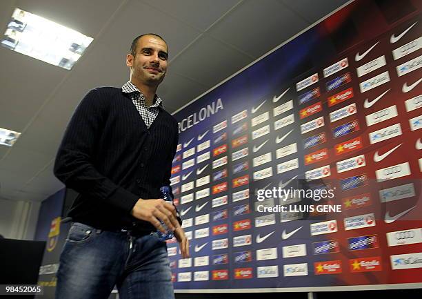 Barcelona's coach Pep Guardiola leaves after giving a press conference in Barcelona on April 9 on the eve a Spanish league football match against...