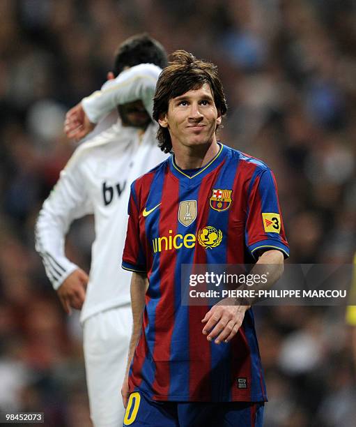 Barcelona's Argentinian forward Lionel Messi gestures during the 'El Clasico' Spanish League football match Real Madrid against Barcelona at the...