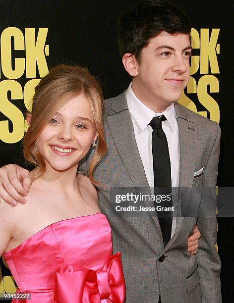 Actors Chloe Moretz and Christopher Mintz-Plasse arrive to the Los Angeles premiere of 'KICK-ASS' at the Cinerama Dome on April 13, 2010 in...