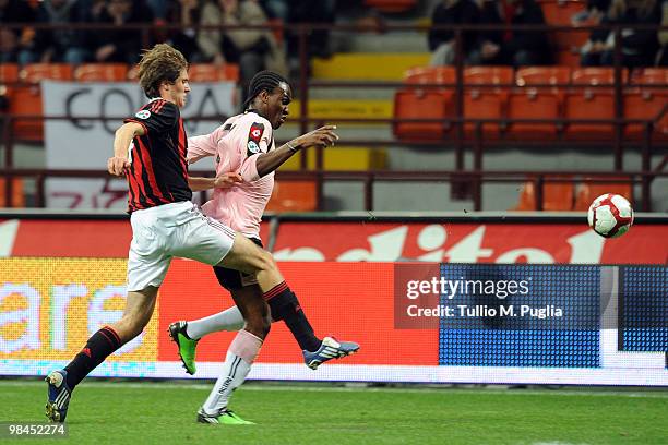 Jerry Mbakogu of Palermo and Simone Romagnoli of Milan compete for the ball during the Primavera Tim Cup between AC Milan and US Citta di Palermo at...