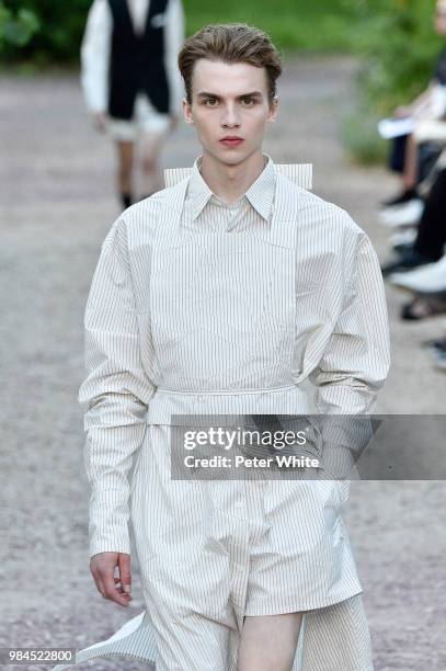 Ernest Klimko walks the runway during the Sean Suen Menswear Spring/Summer 2019 show as part of Paris Fashion Week on June 22, 2018 in Paris, France.