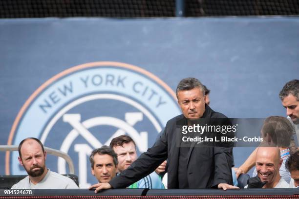 Head Coach Domenec Torrent of New York City watches with NYCFC logo in the background during the MLS match between New York City FC and Toronto FC at...