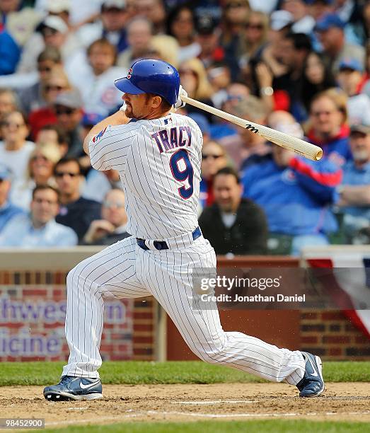 Chad Tracey of the Chicago Cubs fouls off a pitch against the Milwaukee Brewers on Opening Day at Wrigley Field on April 12, 2010 in Chicago,...