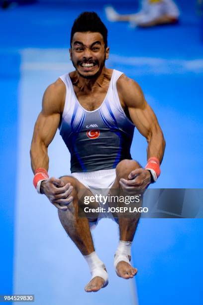 Turkish Ferhat Arican competes during the Men's Vault Final Gymnastics event at the XVIII Mediterranean Games in Reus near Tarragona on June 26, 2018.