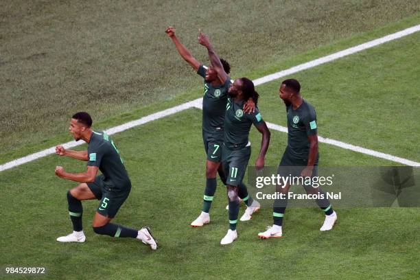 Victor Moses of Nigeria celebrates with teammates after scoring his team's first goal during the 2018 FIFA World Cup Russia group D match between...