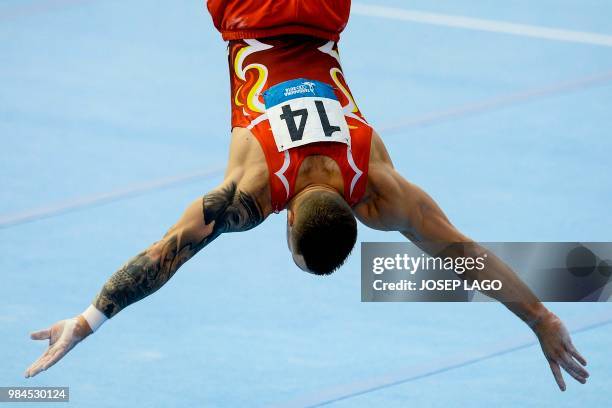 Spanish Nestor Abad competes during the Men's Floor Final Gymnastics event at the XVIII Mediterranean Games in Reus near Tarragona on June 26, 2018.