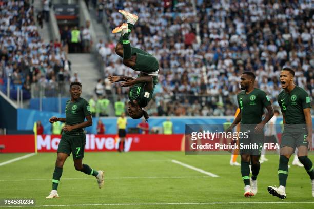 Victor Moses of Nigeria celebrates with teammates after scoring his team's first goal during the 2018 FIFA World Cup Russia group D match between...