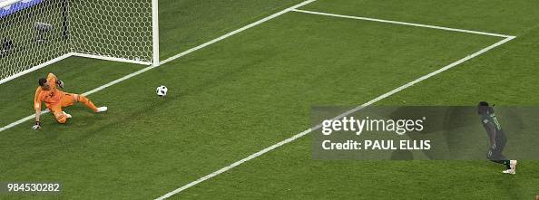 Forward Moses TOPSHOT - Nigeria's forward Victor Moses runs in celebration after ...