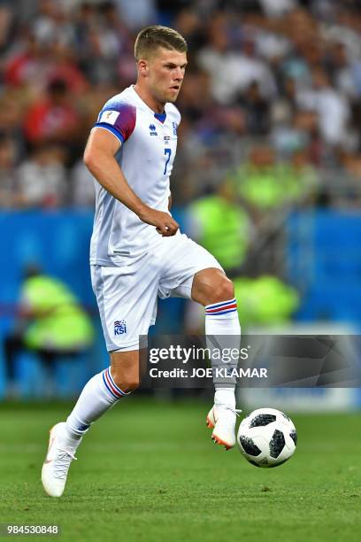 Iceland's midfielder Johann Gudmundsson controls the ball during the Russia 2018 World Cup Group D football match between Iceland and Croatia at the...