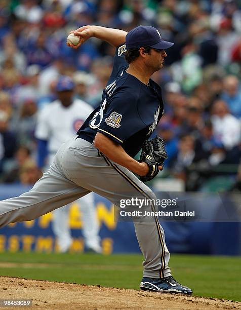 Starting pitcher Doug Davis of the Milwaukee Brewers delivers the ball against the Chicago Cubs on Opening Day at Wrigley Field on April 12, 2010 in...