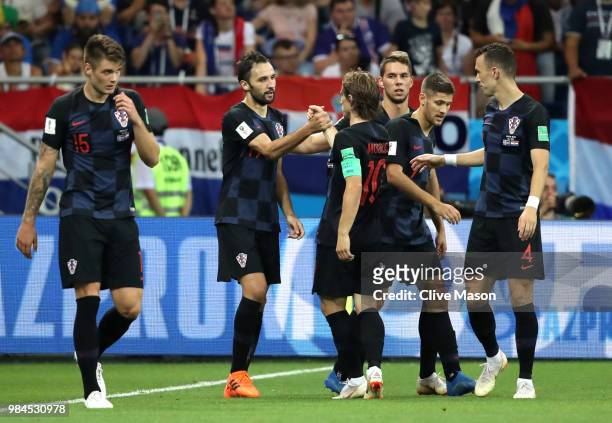 Milan Badelj of Croatia celebrates with teammate Luka Modric after scoring his team's first goal during the 2018 FIFA World Cup Russia group D match...