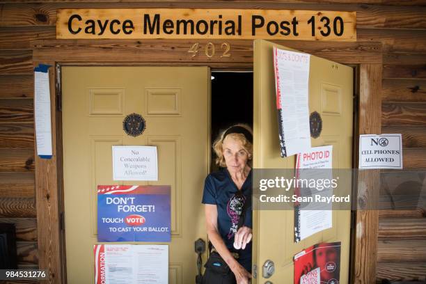 Voter exits a polling station during a primary runoff election at an American Legion hall on June 26, 2018 in Cayce, South Carolina. The most notable...