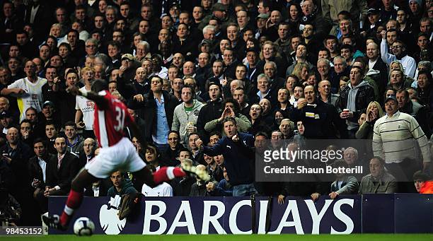 Tottenham Hotspur fans berate Sol Campbell of Arsenal as he kicks the ball during the Barclays Premier League match between Tottenham Hotspur and...