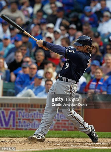 Gregg Zaun of the Milwaukee Brewers hits the ball against the Chicago Cubs on Opening Day at Wrigley Field on April 12, 2010 in Chicago, Illinois....