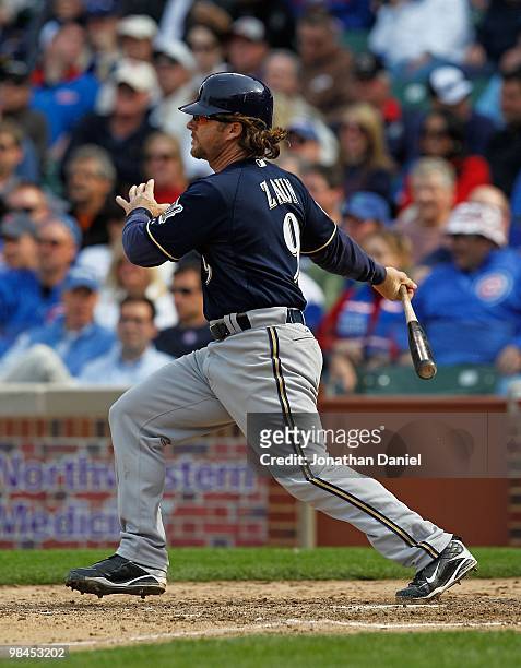 Gregg Zaun of the Milwaukee Brewers hits the ball against the Chicago Cubs on Opening Day at Wrigley Field on April 12, 2010 in Chicago, Illinois....