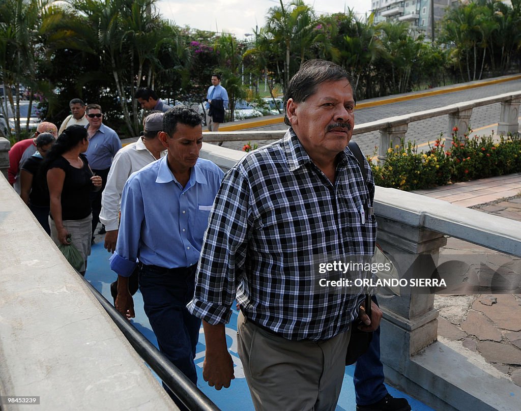 Honduran rural leader Rafael Alegria (R)