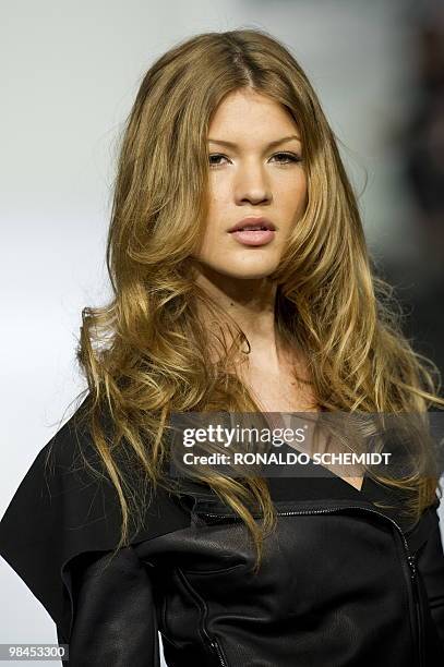 Model displays a creation by Mexican designer Elena Gomez Toussaint during the Mercedes Benz Fashion Week in Mexico City on April 13, 2010. AFP...