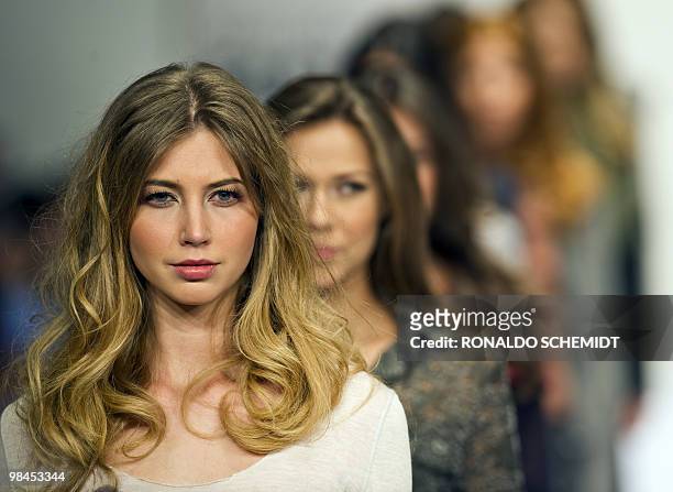 Models display creations by Mexican designer Elena Gomez Toussaint during the Mercedes Benz Fashion Week in Mexico City on April 13, 2010. AFP...