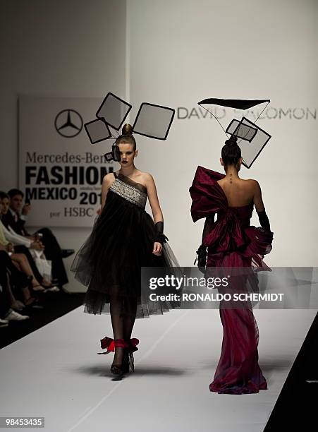 Models displays a creation by Mexican designer David Salomon during the Mercedes Benz Fashion Week in Mexico City on April 13, 2010. AFP...