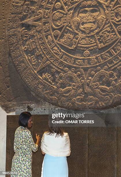 First Lady Michelle Obama and Mexican First Lady Margarita Zavala see the Aztec Calendar during their visit to the Anthropology Museum in Mexico City...