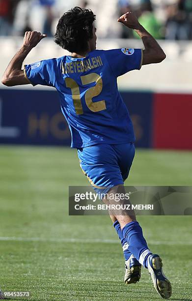 Esteghlal's Mehdi Seyed Salehi celebrates after scoring a goal against Al-Ahli during their AFC Champions League group A football match at Tehran's...