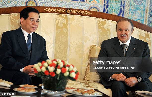 Algerian President Abdelaziz Bouteflika and his Vietnamese counterpart Nguyen Minh Triet looks on during their meeting at Houari Boumediene...