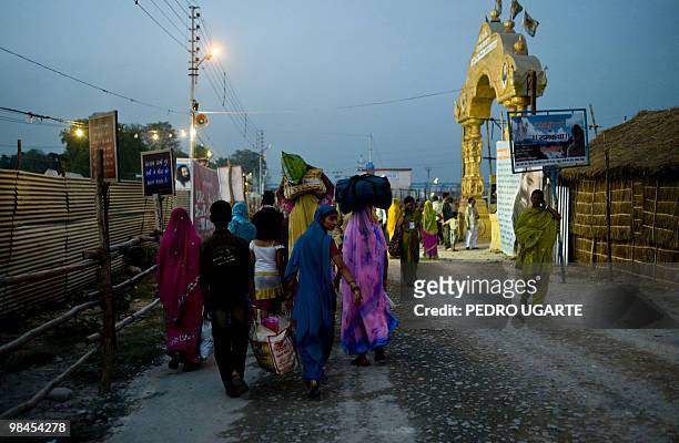 Hindu devotees arrive at Haridwar to celebrate the Kumbh Mela festival on April 12, 2010.The Kumbh Mela, world's largest religious festival, which is...