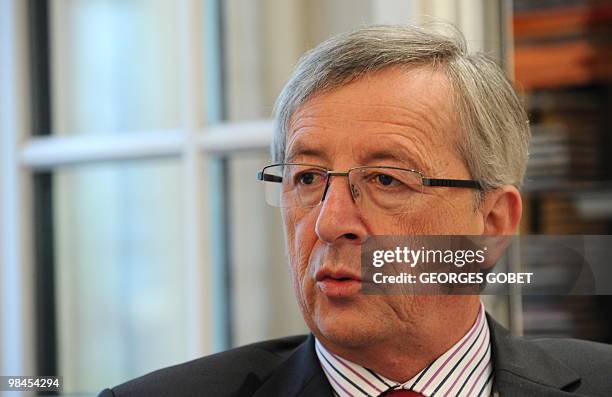 Eurogroup president and Luxembourg Prime Minister Jean-Claude Juncker answers questions in his personal office on April 13, 2010 in Luxemburg during...