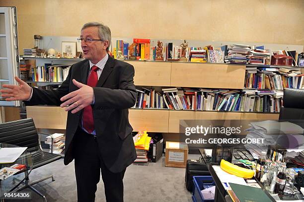 Eurogroup president and Luxembourg Prime Minister Jean-Claude Juncker gestures in his personal office on April 13, 2010 in Luxemburg prior an...