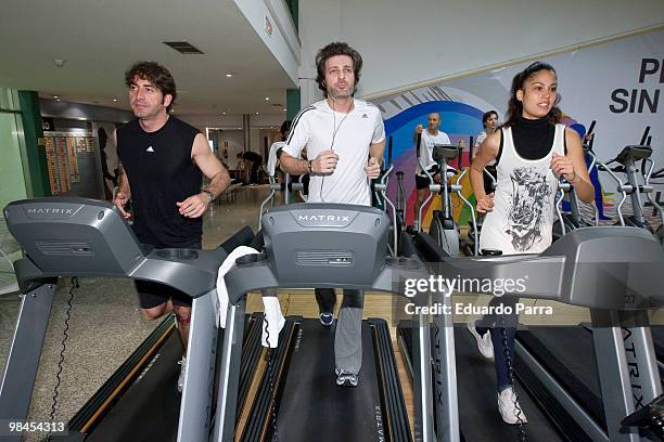 Antonio Garrido, Jesus Olmedo and Patricia Rodriguez run Aldeas infantiles charity race photocall at Palestra gym on April 14, 2010 in Madrid, Spain.