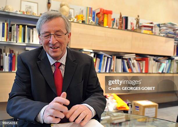 Eurogroup president and Luxembourg Prime Minister Jean-Claude Juncker answers questions in his personal office on April 13, 2010 in Luxemburg during...