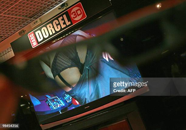 Porn picture is seen through 3D glasses on April 13, 2010 in Cannes, southern France, during the MIPTV, one of the world's largest broadcasting and...