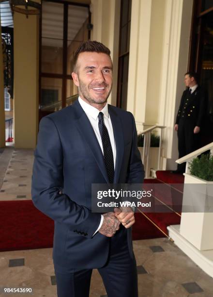 David Beckham attends the Queen's Young Leaders Award Ceremony as Queen Elizabeth II accompanied by Prince Harry, Duke of Sussex and Meghan, Duchess...