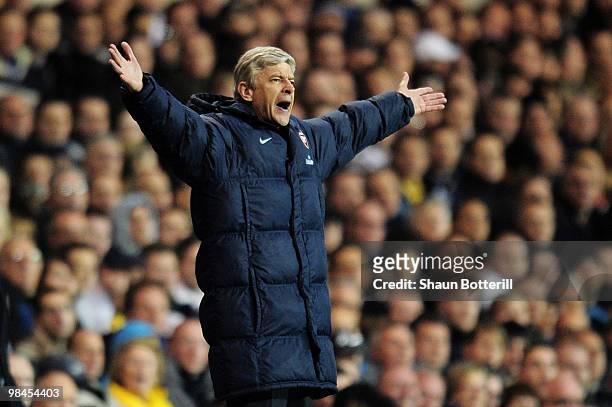 Manager of Arsenal Arsene Wenger shouts to his team during the Barclays Premier League match between Tottenham Hotspur and Arsenal at White Hart Lane...