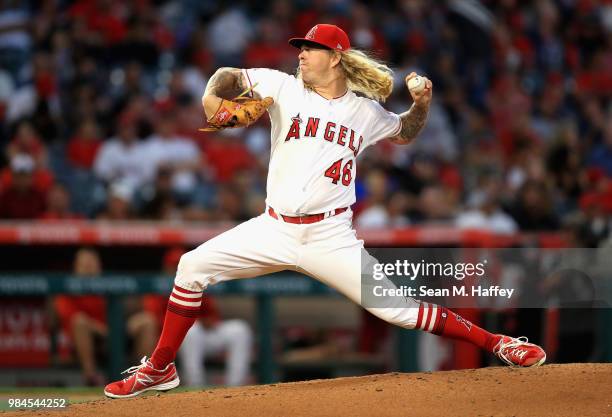 John Lamb of the Los Angeles Angels of Anaheim pitches during the first inning of a game against the Toronto Blue Jays at Angel Stadium on June 21,...