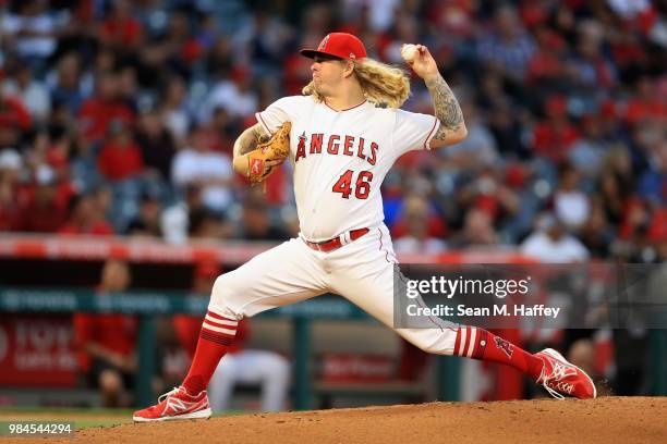 John Lamb of the Los Angeles Angels of Anaheim pitches during the first inning of a game against the Toronto Blue Jays at Angel Stadium on June 21,...