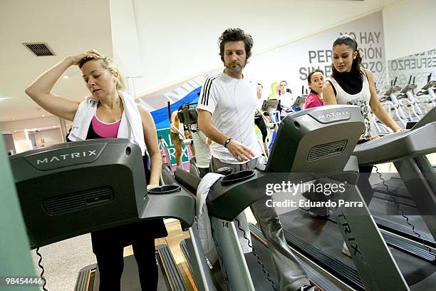 Pilar Castro, Jesus Olmedo and Patricia Rodriguez run Aldeas infantiles charity race photocall at Palestra gym on April 14, 2010 in Madrid, Spain.